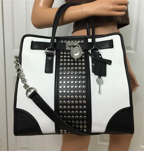 new michael kors purse black and white|Michael Kors black shiny purse.